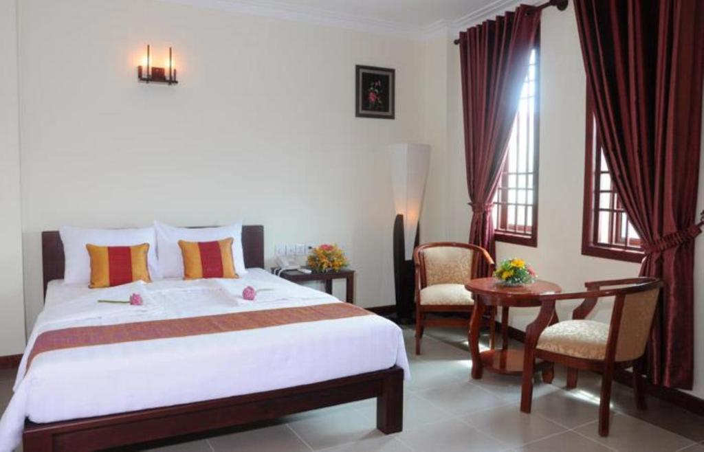 V N E Hotel Phnom Penh Zimmer foto